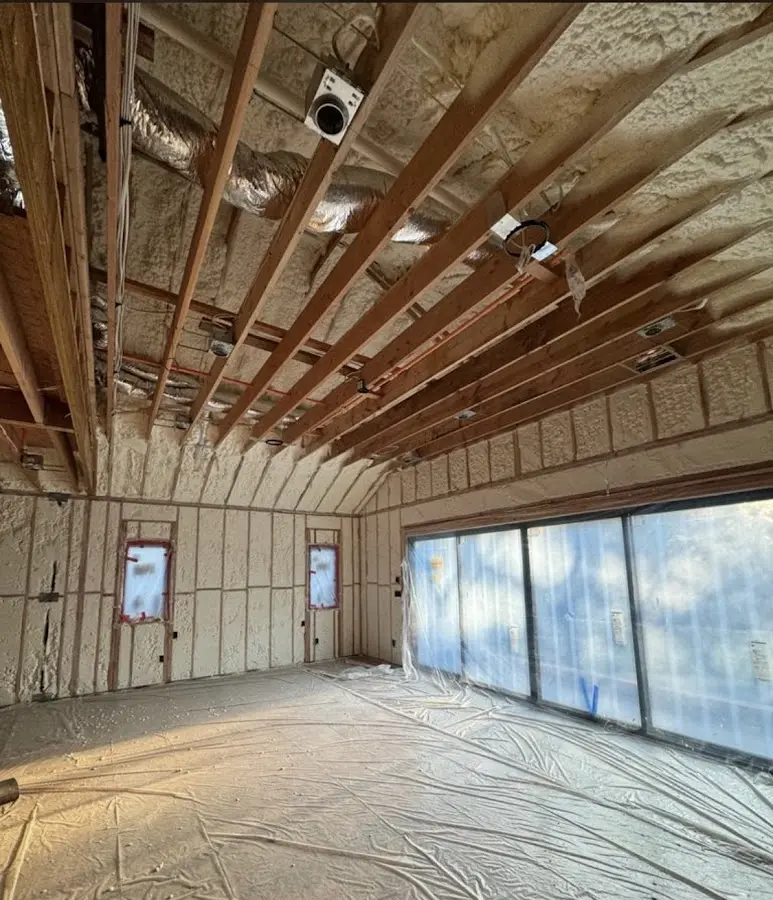 Interior walls and ceiling insulated with spray foam during new construction in Aledo